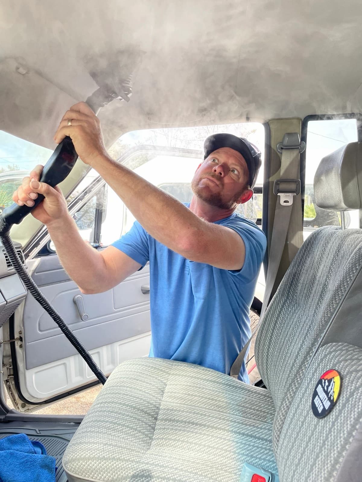 Steam cleaning a vehicle interior